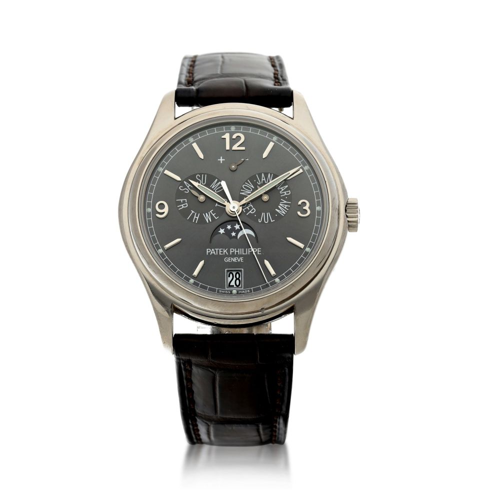 PATEK PHILIPPE | REFERENCE 5146G A WHITE GOLD AUTOMATIC ANNUAL CALENDAR WRISTWATCH WITH MOON PHASES AND POWER RESERVE, CIRCA 2013