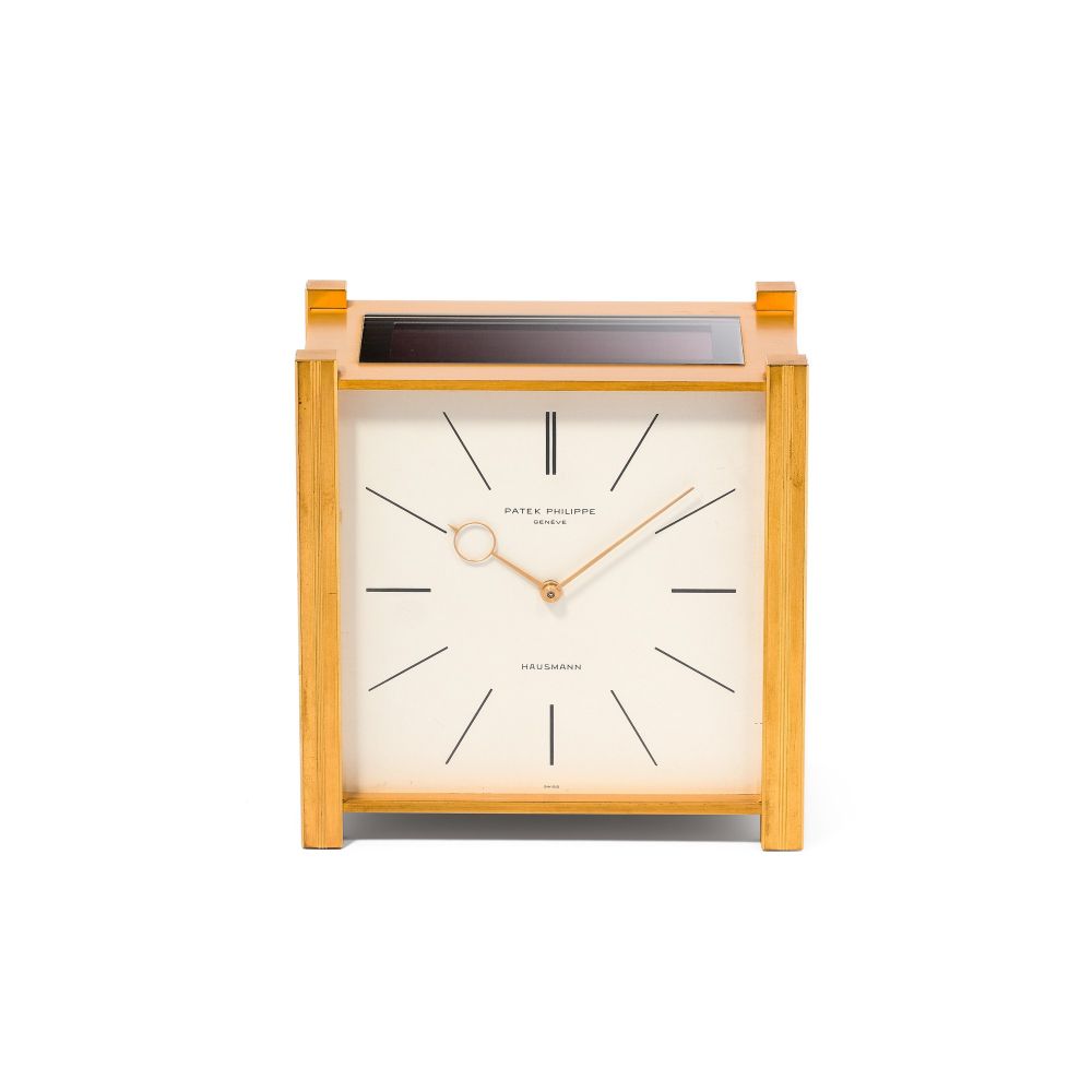 PATEK PHILIPPE | REFERENCE 928 PENDULE CARRÉE, RETAILED BY HAUSMANN: A GILT BRASS SOLAR DESK TIMEPIECE, MADE IN 1962