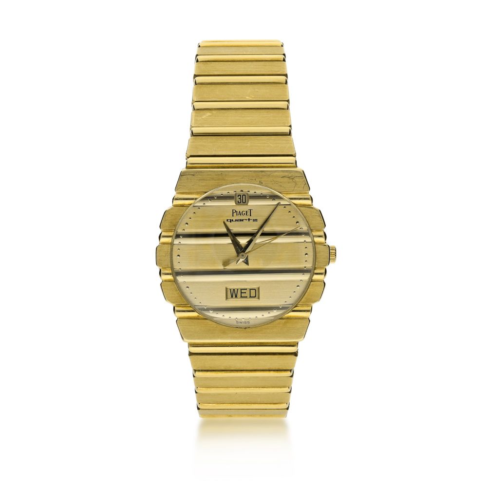 PIAGET | REFERENCE 15562 C 701 POLO A YELLOW GOLD BRACELET WATCH WITH DAY AND DATE, CIRCA 1995
