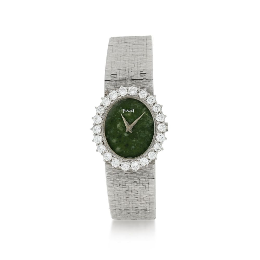 PIAGET | REFERENCE 9338 A 6 A WHITE GOLD AND DIAMOND-SET BRACELET WATCH WITH JADE DIAL, CIRCA 1985