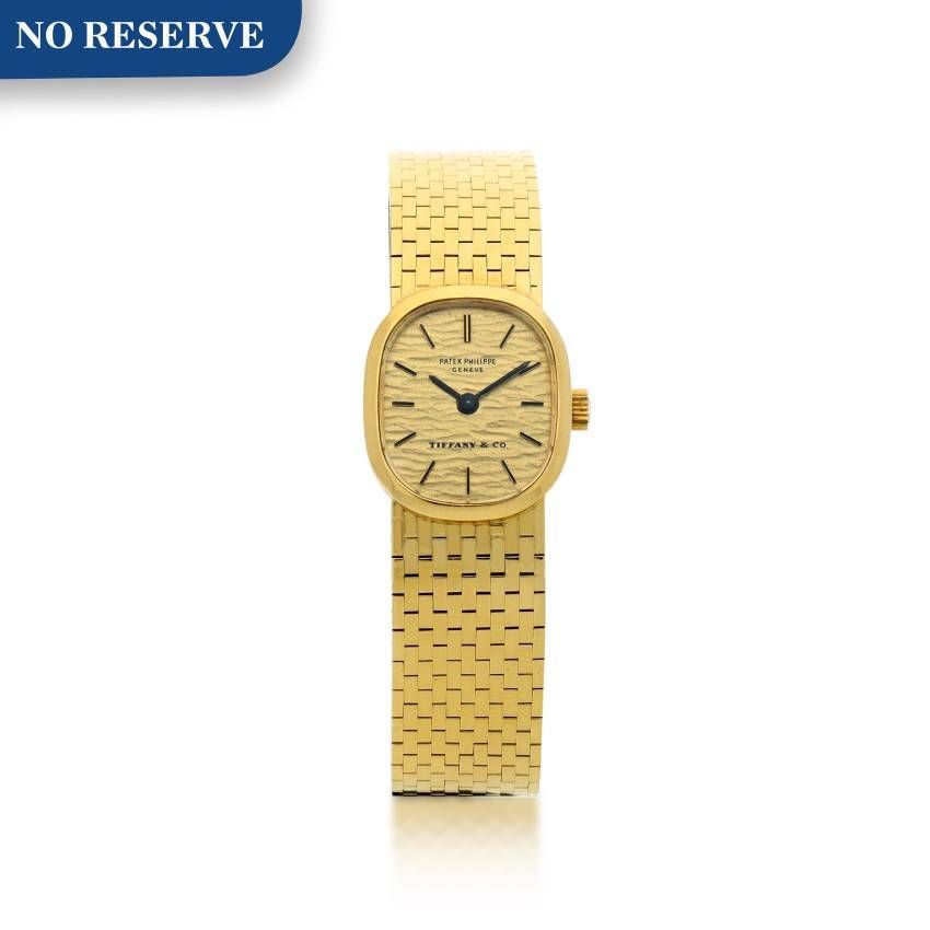 PATEK PHILIPPE | REFERENCE 4106 RETAILED BY TIFFANY & CO.: A YELLOW GOLD BRACELET WATCH, MADE IN 1974