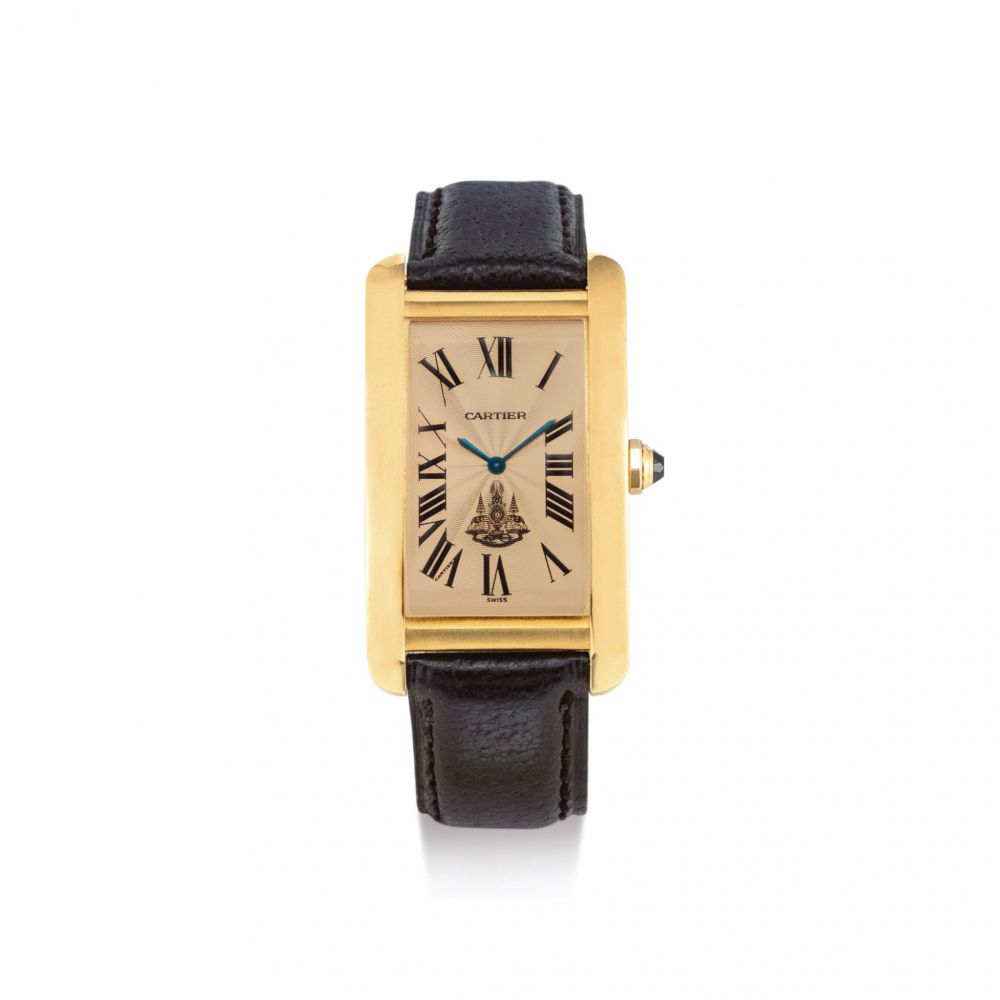 CARTIER | TANK AMERICAINE, REFERENCE 1735 1, A YELLOW GOLD WRISTWATCH WITH SALMON DIAL, MADE TO COMMEMORATE KING RAMA IX AND HIS ROYAL 50TH ANNIVERSARY, CIRCA 1990