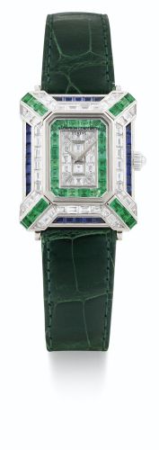 Vacheron Constantin.A LADY'S WHITE GOLD, EMERALD, SAPPHIRE AND DIAMOND-SET RECTANGULAR WRISTWATCH REF 16580 CASE 674628 CIRCA 1990