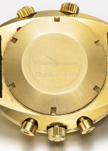 Omega.A LARGE AND VERY RARE 18K YELLOW GOLD TWO TIME ZONE CHRONOGRAPH WRISTWATCH WITH REGISTERS REF 345.0801 FLIGHTMASTER CIRCA 1971