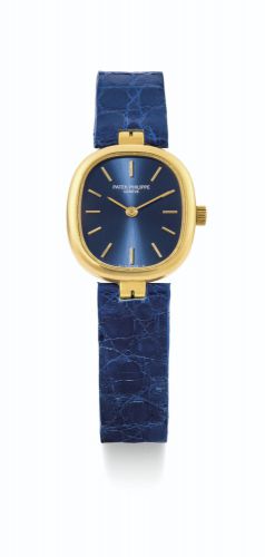 Patek Philippe.A LADY'S YELLOW GOLD CUSHION-FORM WRISTWATCH REF 4564 MVT 1414705 CASE 2906226 ELLIPSE MADE IN 1991