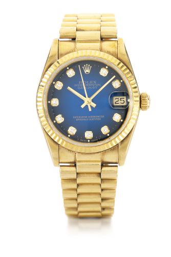 Rolex.A LADY'S YELLOW GOLD AND DIAMOND-SET AUTOMATIC WRISTWATCH WITH BRACELET REF 68278 MVT 475312 CASE 9670032 DATEJUST CIRCA 2005