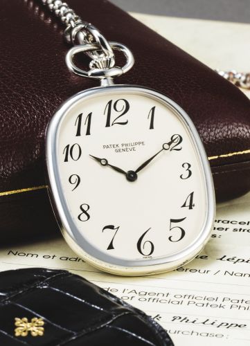 Patek Philippe.A RARE WHITE GOLD OVAL OPEN-FACED KEYLESS LEVER DRESS WATCH REF 874 MVT 1338005 CASE 531600 ELLIPSE MADE IN 1989.A RARE WHITE GOLD OVAL OPEN-FACED KEYLESS LEVER DRESS WATCH REF 874 MVT 1338005 CASE 531600 ELLIPSE MADE IN 1989