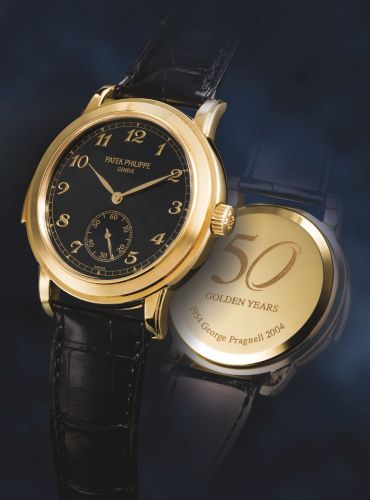 Patek Philippe.A VERY FINE AND RARE LIMITED EDITION YELLOW GOLD AUTOMATIC MINUTE REPEATING WRISTWATCH WITH BLACK DIAL AND CATHEDRAL GONGS REF 5079J MVT 1904152 CASE 4261705 MADE FOR THE 50TH ANNIVERSARY OF GEORGE PRAGNELL LTD CIRCA 2004.A VERY FINE AND RA