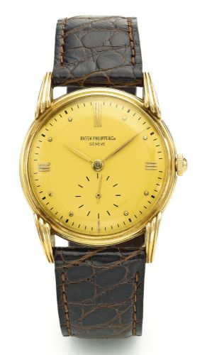 Patek Philippe.A VERY FINE AND RARE PINK GOLD WRISTWATCH REF 2407 MVT 951324 CASE 421088 MADE IN 1947