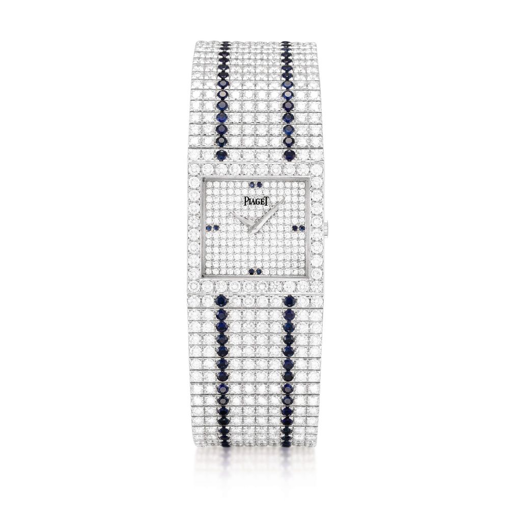 Piaget | Reference 9131 C627, A white gold, diamond and sapphire-set bracelet watch, Circa 1990 | 伯爵 | 型號9131 C627 白金鑲鑽石及藍寶石鏈帶腕錶，約1990年製