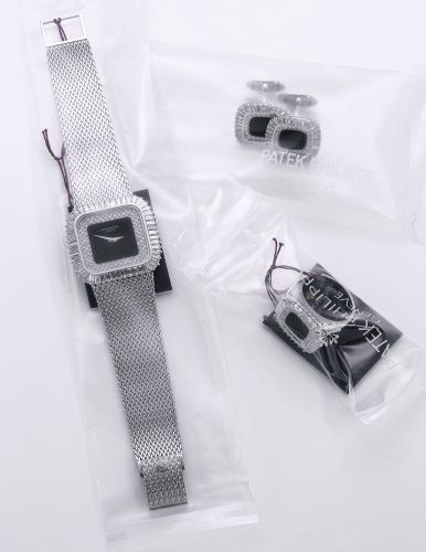 Patek Philippe A FINE AND RARE WHITE GOLD AND DIAMOND-SET CUSHION-SHAPED BRACELET WATCH WITH ONYX DIAL TOGETHER WITH MATCHING RING AND PAIR OF CUFF LINKS REF 3625/1 MVT 1276227 CASE 2764309 MADE IN 1977