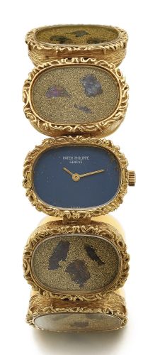 Patek Philippe A LADY'S FINE AND UNUSUAL YELLOW GOLD BRACELET WATCH WITH BUTTERFLY WING MOTIFS REF 4119/1 MVT 998743 CASE 2694305 MADE IN 1970