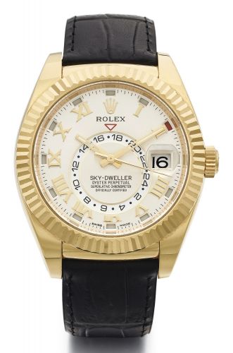 Rolex A LARGE YELLOW GOLD AUTOMATIC WRISTWATCH WITH DATE DUAL TIME ZONE AND ANNUAL CALENDAR REF 326138 SKY-DWELLER CIRCA 2012