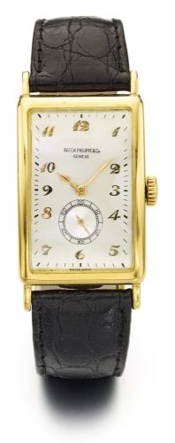 Patek Philippe A LARGE YELLOW GOLD RECTANGULAR HINGED CURVED WRISTWATCH REF 431 MVT 950578 CASE 644257 MADE IN 1946