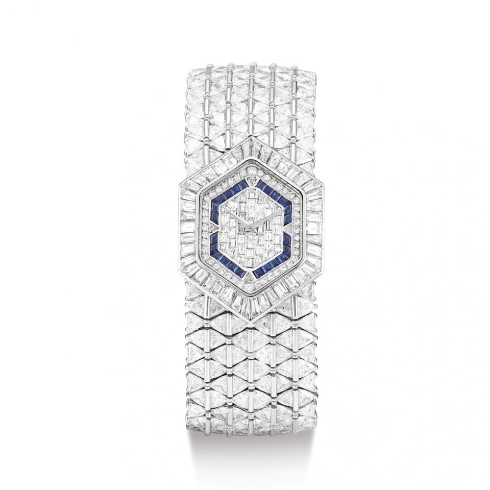 DELANEAU | ECLAT A WHITE GOLD, SAPPHIRE AND DIAMOND-SET BRACELET WATCH, CIRCA 1990 | Eclat 白金藍寶石及鑲鑽石鏈帶腕錶，錶殼編號G527，約1990年製