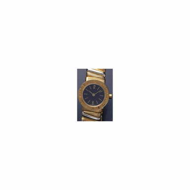 A LADY'S TWO-COLOUR GOLD BANGLE WATCH, BVLGARI, BVLGARI-BVLGARI TUBOGAS, CIRCA 1995