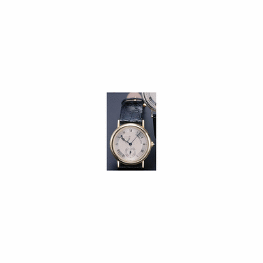 A GOLD WRISTWATCH WITH POWER RESERVE INDICATION, BREGUET, REF. 3360, CIRCA 1996