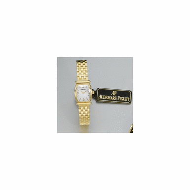 A LADY'S GOLD TONNEAU BRACELET WATCH, AUDEMARS PIGUET, 'CARNEGIE' MODEL, CIRCA 2002