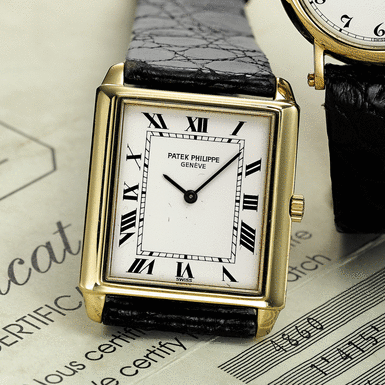 PATEK PHILIPPE, A&&NBSP - SLIM GOLD RECTANGULAR WRISTWATCH CHINESE TANK, CIRCA 1979, NO. 1.362.920, REF. 3671