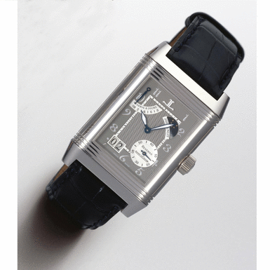 JAEGER-LECOULTRE - A fine, rare and large platinum eight day twin barrelled wristwatch with power reserve, moon phases and date Reverso, Septanti