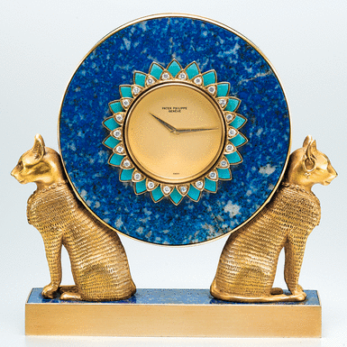 PATEK PHILIPPE, A FINE AND UNIQUE GOLD, LAPIS LAZULI, TURQUOISE AND DIAMOND SET MINIATURE EGYPTIAN-STYLE TABLE CLOCK 1978&&NBSP - REF 2011 MVT 1500401 CASE 2780492