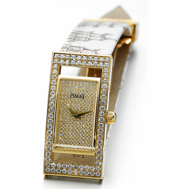 PIAGET, A LADY'S GOLD AND DIAMOND SET RECTANGULAR WRISTWATCH CIRCA 2006 REF P10154