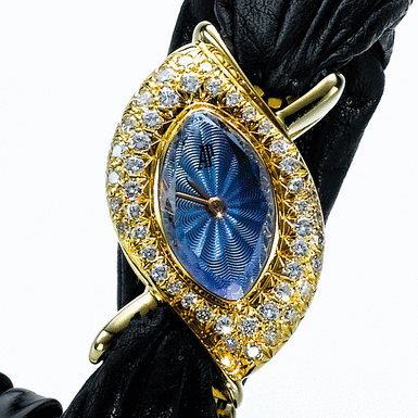 AUDEMARS PIGUET & CORUM, A LADY'S GOLD AND DIAMOND SET MARQUISE FORM WRISTWATCH WITH AMETHYST TOP CIRCA 1995 - NBSP