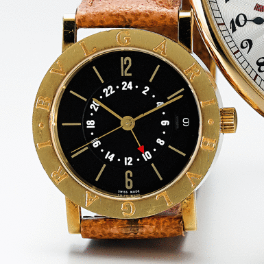 BVLGARI, A GOLD AUTOMATIC CENTRE SECONDS DUAL TIME ZONE WRISTWATCH CIRCA 2000