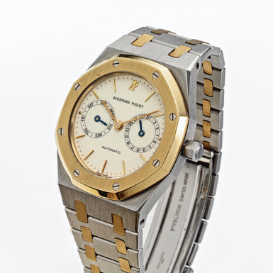 AUDEMARS PIGUET - A Stainless Steel and Gold Automatic Bracelet Watch with Day and Date CIRCA 1985 ROYAL OAK NO 252