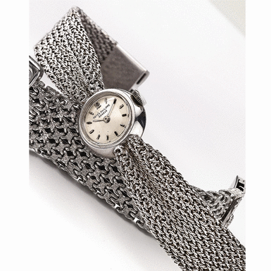 PATEK PHILIPPE - A Lady's White Gold Bracelet Watch 1956 REF 3006G MVT 948123 CASE 692595