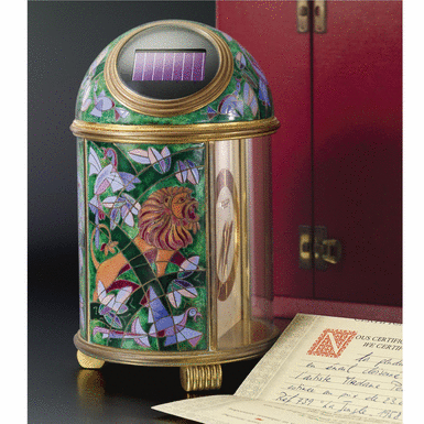 Various Owners - PATEK PHILIPPE - A fine and unique gilt-brass solar-powered desk timepiece with cloisonn
