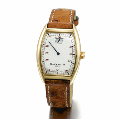 FRANCK MULLER - a gold tonneau form jump hour wristwatch Circa 1997 ref 7500 SC No 33