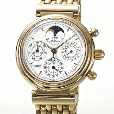 INTERNATIONAL WATCH CO., A GOLD AUTOMATIC PERPETUAL CALENDAR CHRONOGRAPH BRACELET WATCH WITH YEAR, MOON-PHASES AND REGISTERS CIRCA 2000 DA VINCI