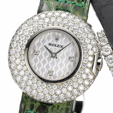 ROLEX, A LADY'S WHITE GOLD AND DIAMOND SET WRISTWATCH WITH MOTHER-OF-PEARL DIAL CIRCA&&NBSP - 2005 ORCHID&&NBSP