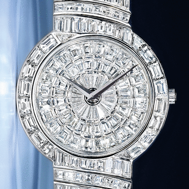 VACHERON CONSTANTIN, A LADY'S IMPRESSIVE AND MAGNIFICENT WHITE GOLD AND STEP CUT DIAMOND SET BRACELET WATCH CIRCA 1990 KALLA VAGUE NO 1