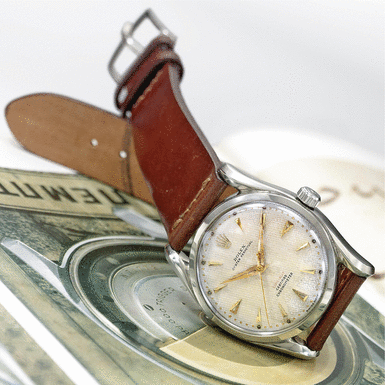 ROLEX - A RARE STAINLESS STEEL AUTOMATIC SWEEP SECONDS WRISTWATCH CIRCA 1949 REF 5018 'BOMB