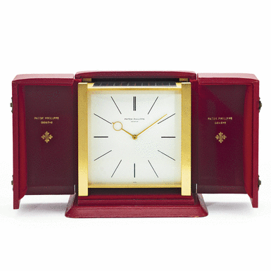 PATEK PHILIPPE - A GILT METAL SOLAR-POWERED DESK TIMEPIECE 1962 REF 919 PENDULE CARR