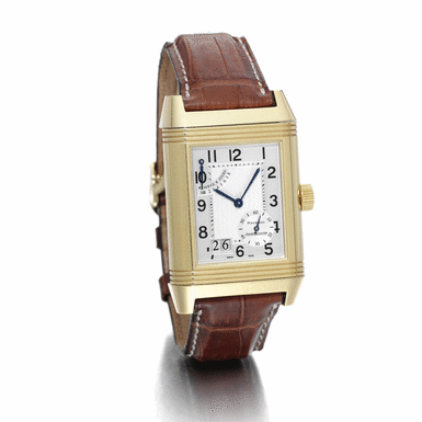 JAEGER-LECOULTRE - A YELLOW GOLD RECTANGULAR REVERSIBLE WRISTWATCH WITH DATE AND 8-DAY POWER RESERVE INDICATION CIRCA 2000 REF 240 1 15 REVERSO GRANDE DATE