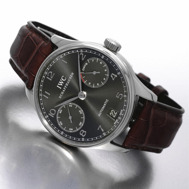 INTERNATIONAL WATCH CO. - AN OVER-SIZED WHITE GOLD AUTOMATIC WRISTWATCH WITH 7-DAY POWER RESERVE INDICATION CIRCA 2005 PORTUGUESE