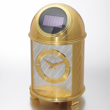 PATEK PHILIPPE - A GILT BRASS SOLAR-POWERED DESK TIMEPIECE 1957 REF 701 MVT 872637 CASE 149