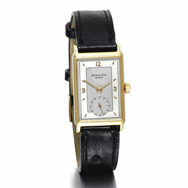 PATEK PHILIPPE - A YELLOW GOLD RECTANGULAR WRISTWATCH WITH TWO-TONE DIAL 1943 REF 1443J MVT 836171 CASE 622652