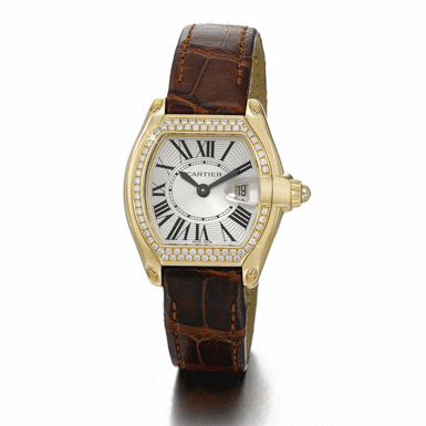 CARTIER - A YELLOW GOLD AND DIAMOND SET TONNEAU FORM WRISTWATCH WITH DATE CIRCA 2004 ROADSTER