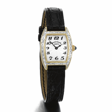 FRANCK MULLER - A LADY'S YELLOW GOLD AND DIAMOND SET TONNEAU FORM WRISTWATCH CIRCA 2000 REF 2500 QZ BG NO 1