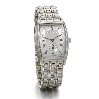 BREGUET - A LADY'S WHITE GOLD TONNEAU FORM AUTOMATIC BRACELET WATCH CIRCA 2002 REF 8670 NO 3519