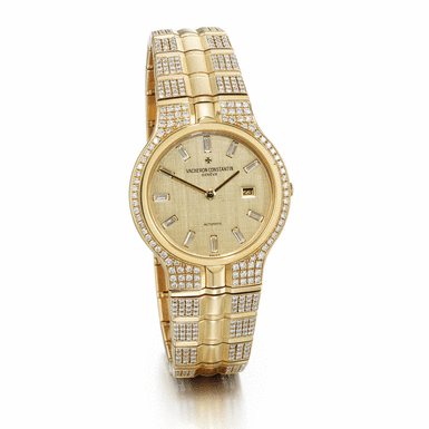 VACHERON CONSTANTIN - A FINE GOLD AND DIAMOND-SET AUTOMATIC BRACELET WATCH WITH DATE CIRCA 1995 PHIDIAS NO 1069