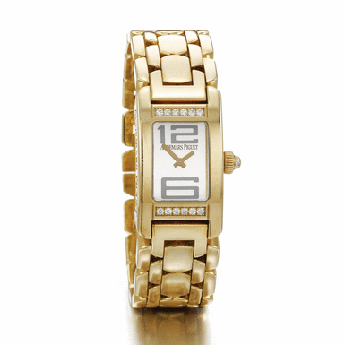 AUDEMARS PIGUET - A LADY'S YELLOW GOLD AND DIAMOND CURVED RECTANGULAR BRACELET WATCH CIRCA 2005 PROMESSE