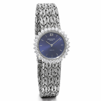 PATEK PHILIPPE - RETAILED BY GUBELIN: A LADY'S WHITE GOLD AND DIAMOND BRACELET WATCH 1973 REF 4136/1G MVT 1265737 CASE 2711369