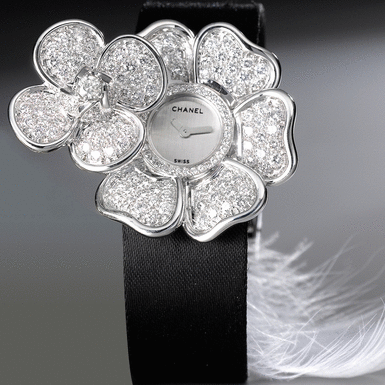 CHANEL - A LADY'S WHITE GOLD AND DIAMOND-SET WRISTWATCH WITH CONCEALED DIAL CIRCA 2006 CAM