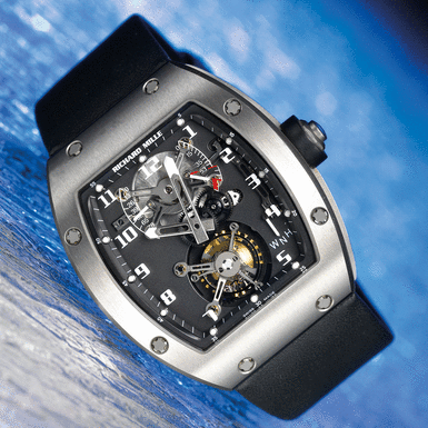 RICHARD MILLE - A FINE TITANIUM TOURBILLON WRISTWATCH WITH POWER RESERVE AND TORQUE INDICATION CIRCA 2007 RM002