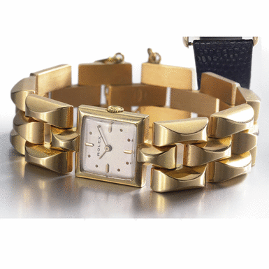 ROLEX - A LADY'S 18K YELLOW GOLD RECTANGULAR BRACELET WATCH CIRCA 1940 REF 3911